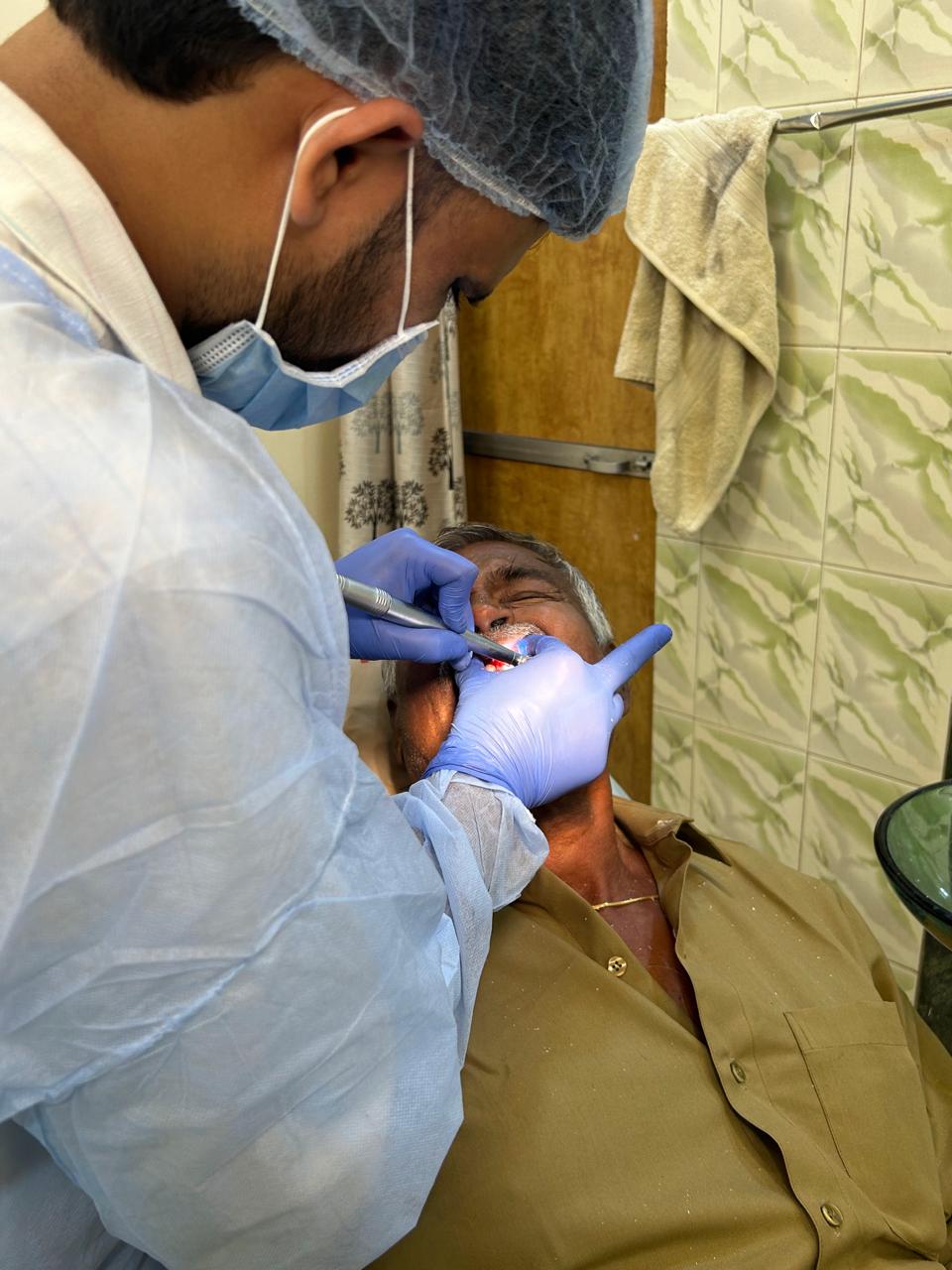 Dr. Parvez Treating Patient